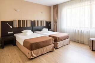 Отель Hotel Parliament Бухарест Двухместный номер с 2 отдельными кроватями - Подходит для гостей с ограниченными физическими возможностями-1