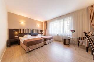 Отель Hotel Parliament Бухарест Двухместный номер с 2 отдельными кроватями - Подходит для гостей с ограниченными физическими возможностями-3
