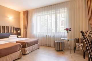 Отель Hotel Parliament Бухарест Двухместный номер с 2 отдельными кроватями - Подходит для гостей с ограниченными физическими возможностями-4