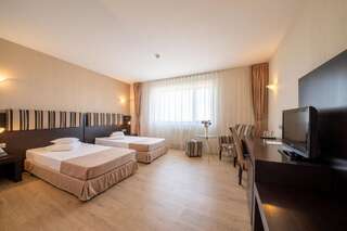 Отель Hotel Parliament Бухарест Двухместный номер Делюкс с 2 отдельными кроватями-1